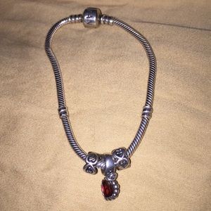 Pandora Bracelet has 3 charms. Authentic.Used.
